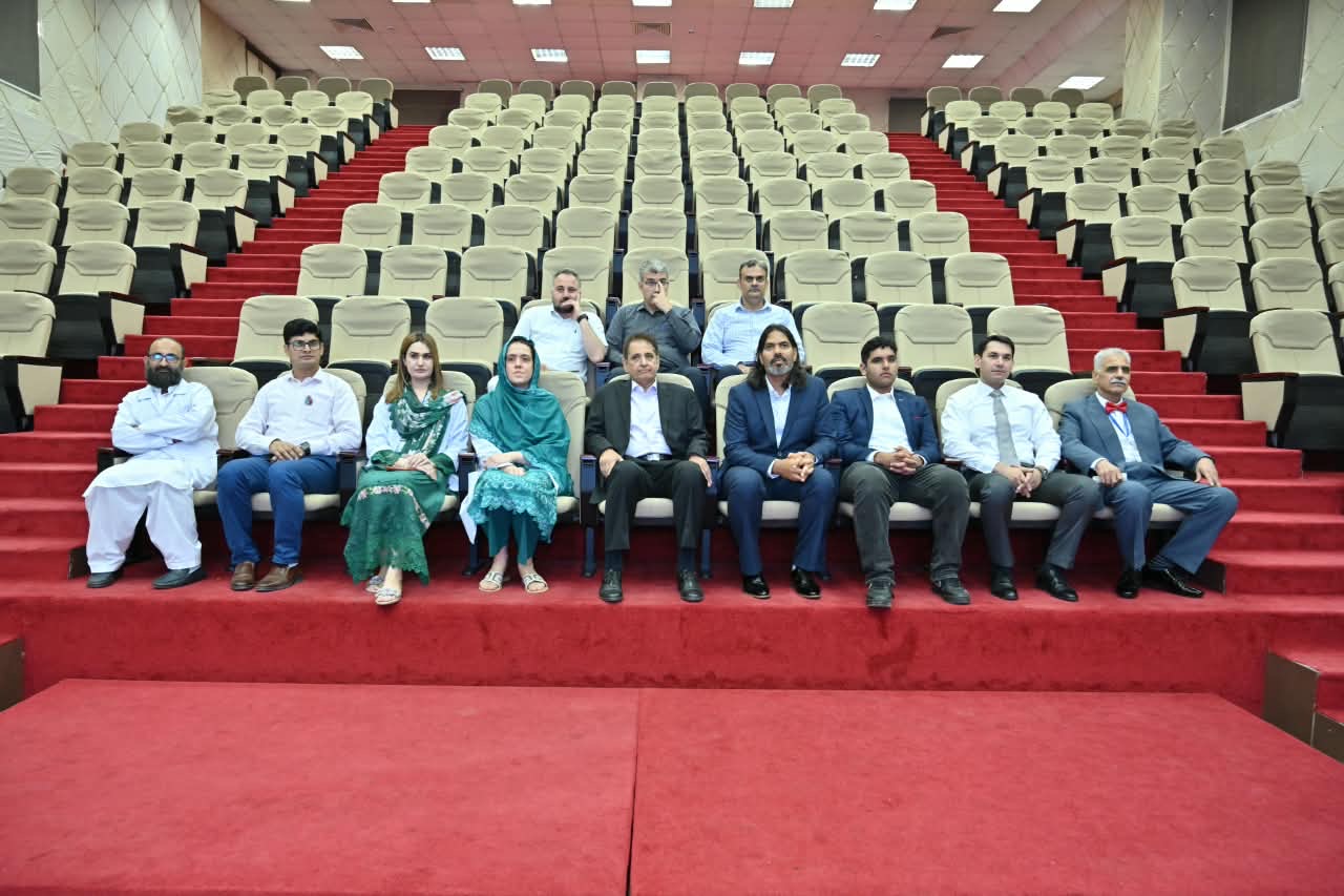 PIC and ClinRé Foundation representatives seated in the PIC auditorium